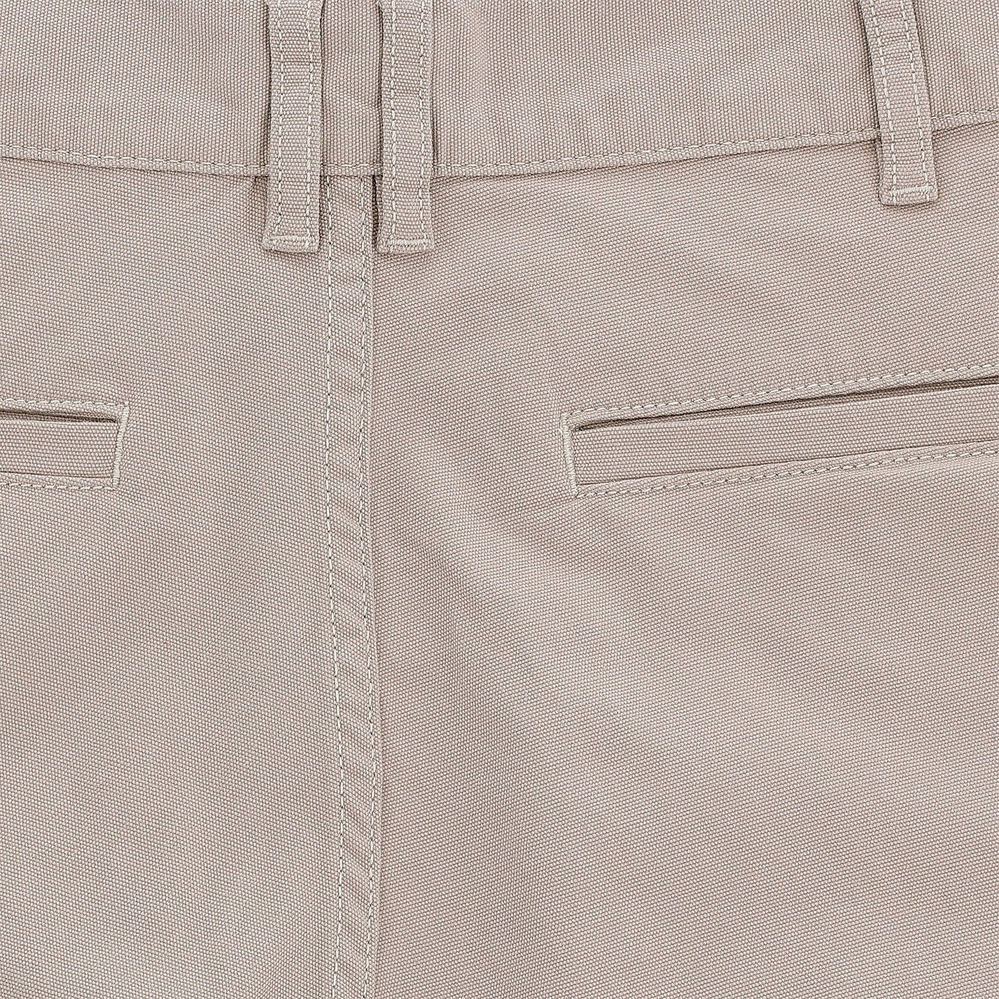 Close-up of Tom Beckbes Reid Short in beige, featuring mid-rise, double belt loops, horizontal pockets, detailed stitching.