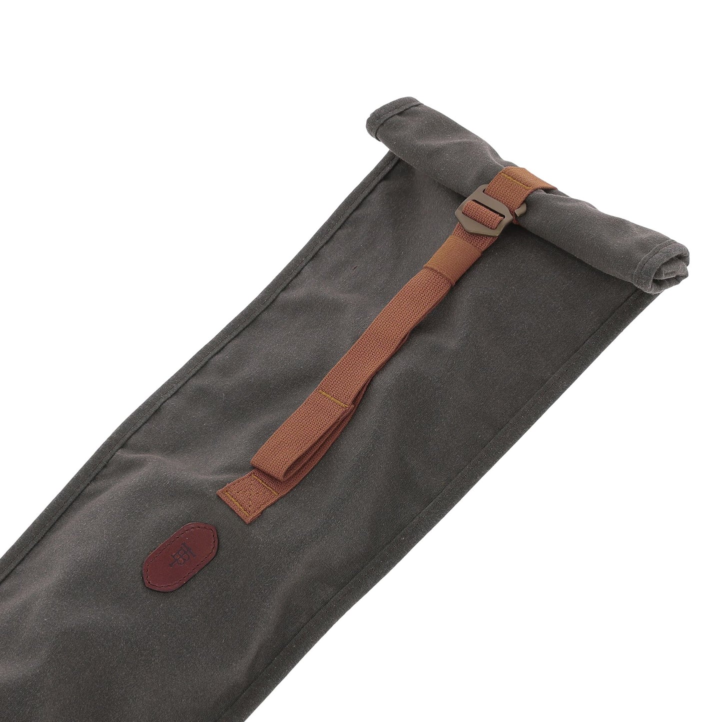 Tom Beckbe Canvas Roll Top Gun Sleeve in dark gray waxed cotton with a brown adjustable strap, shown on white.