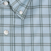 Close-up of the Tom Beckbe Tidewater Shirt, a light blue plaid outdoor shirt with white buttons and pointed collar.