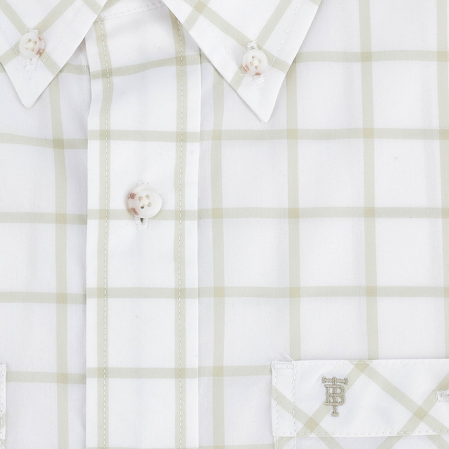 Close-up of the Tom Beckbe Tidewater Shirt: lightweight beige plaid, white buttons, and monogrammed pocket.