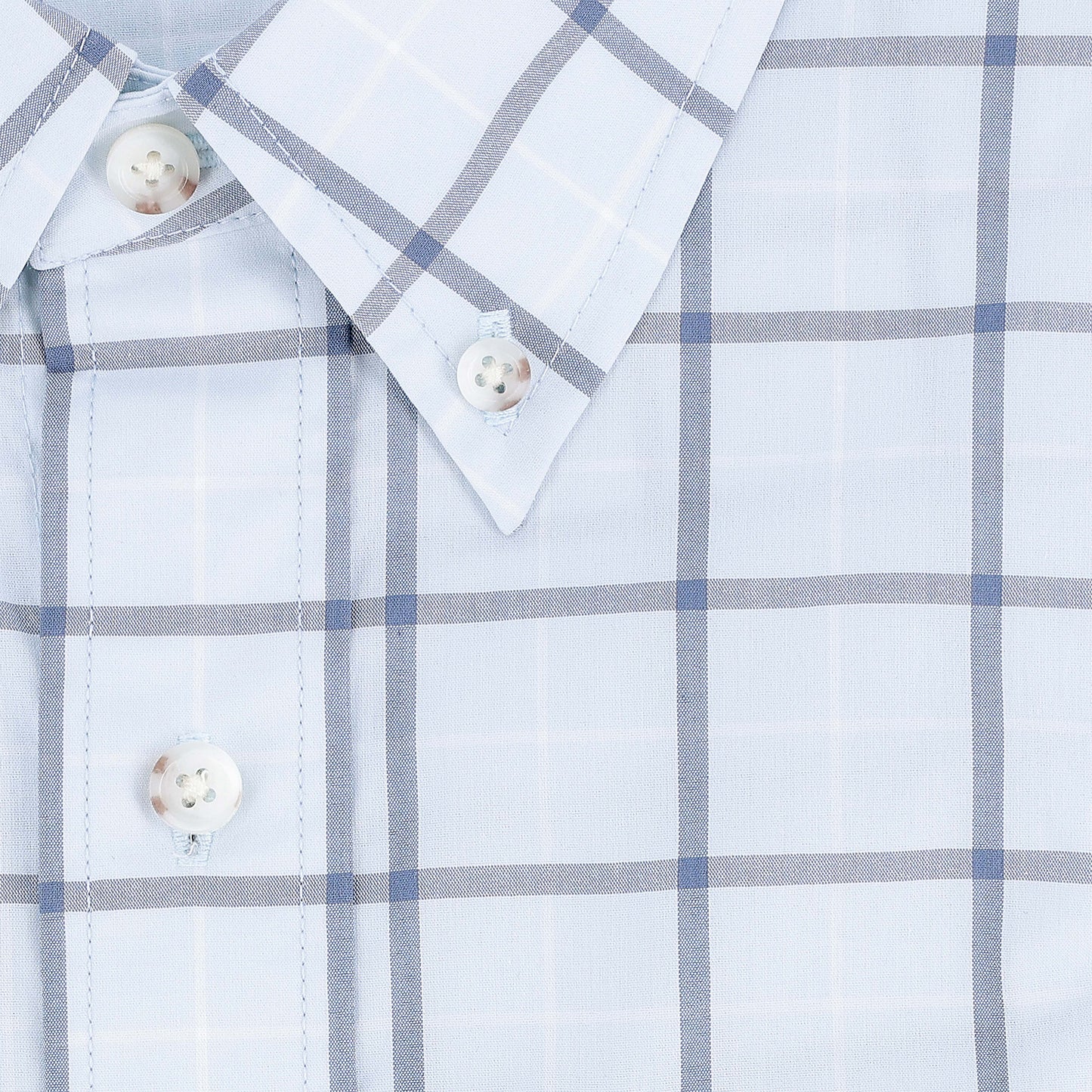 Tom Beckbe Tidewater Shirt: light blue/white plaid, long sleeve, UPF 30+, white buttons, pointed collar shown close-up.