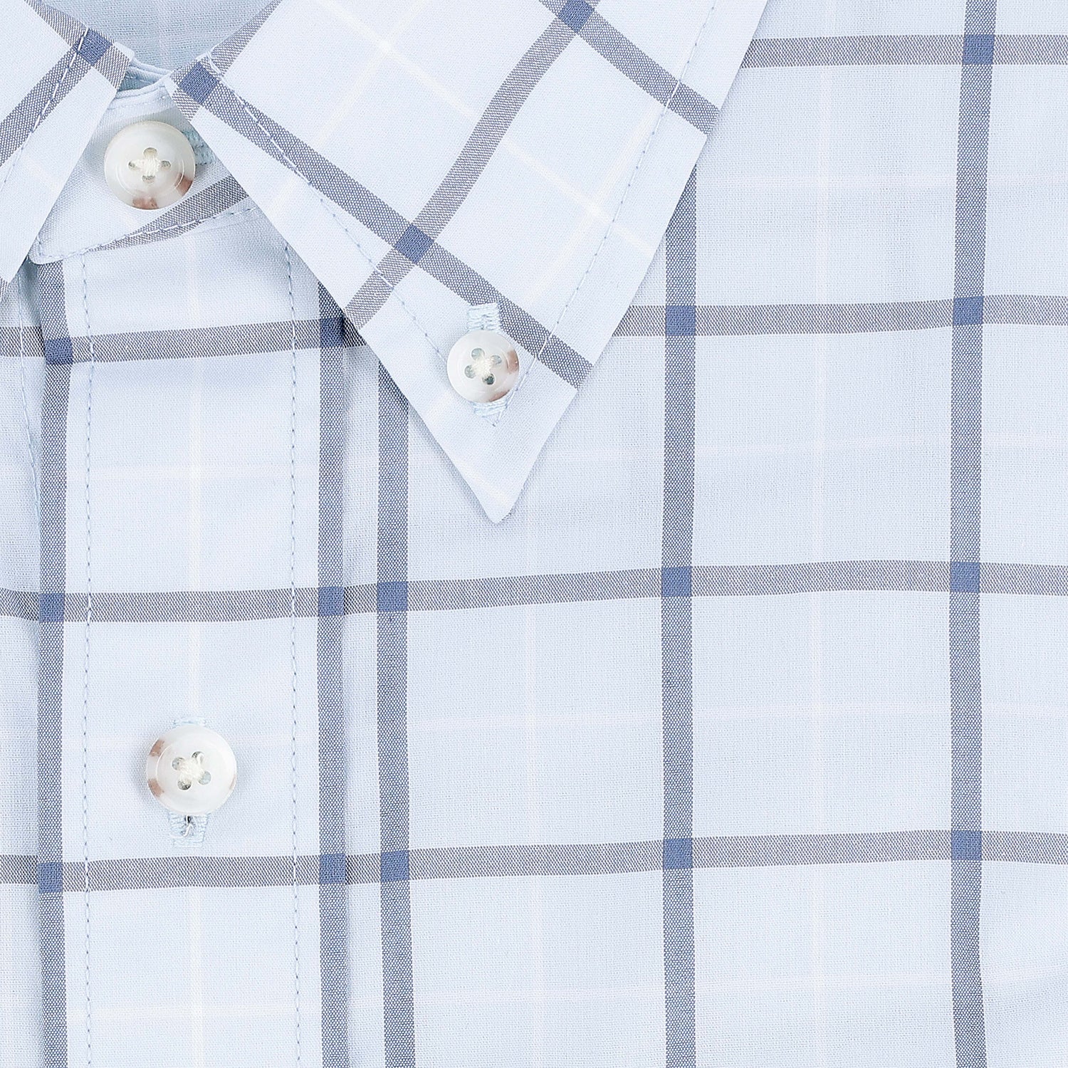 Tom Beckbe Tidewater Shirt: light blue/white plaid, long sleeve, UPF 30+, white buttons, pointed collar shown close-up.