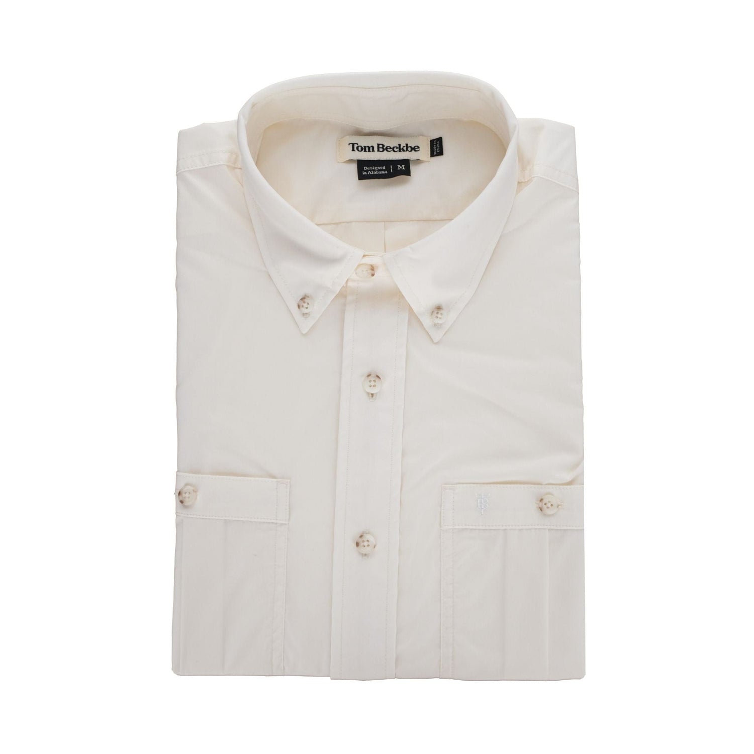 Tidewater Shirt by Tom Beckbe: Beige, short sleeves, folded with a buttoned collar and front pockets.