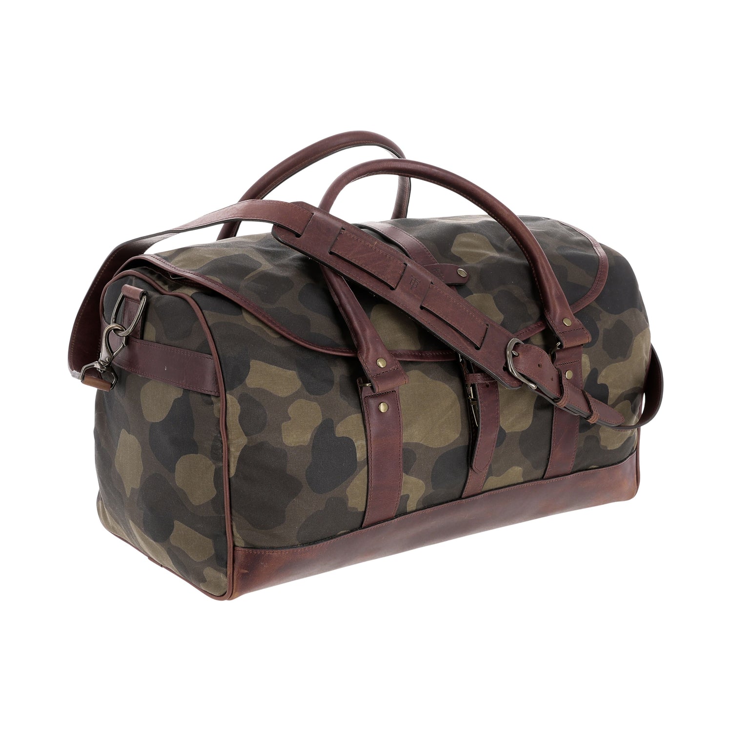 The Tom Beckbe Classic Camo Weekender Duffel Bag features brown leather straps and durable waxed cotton canvas.