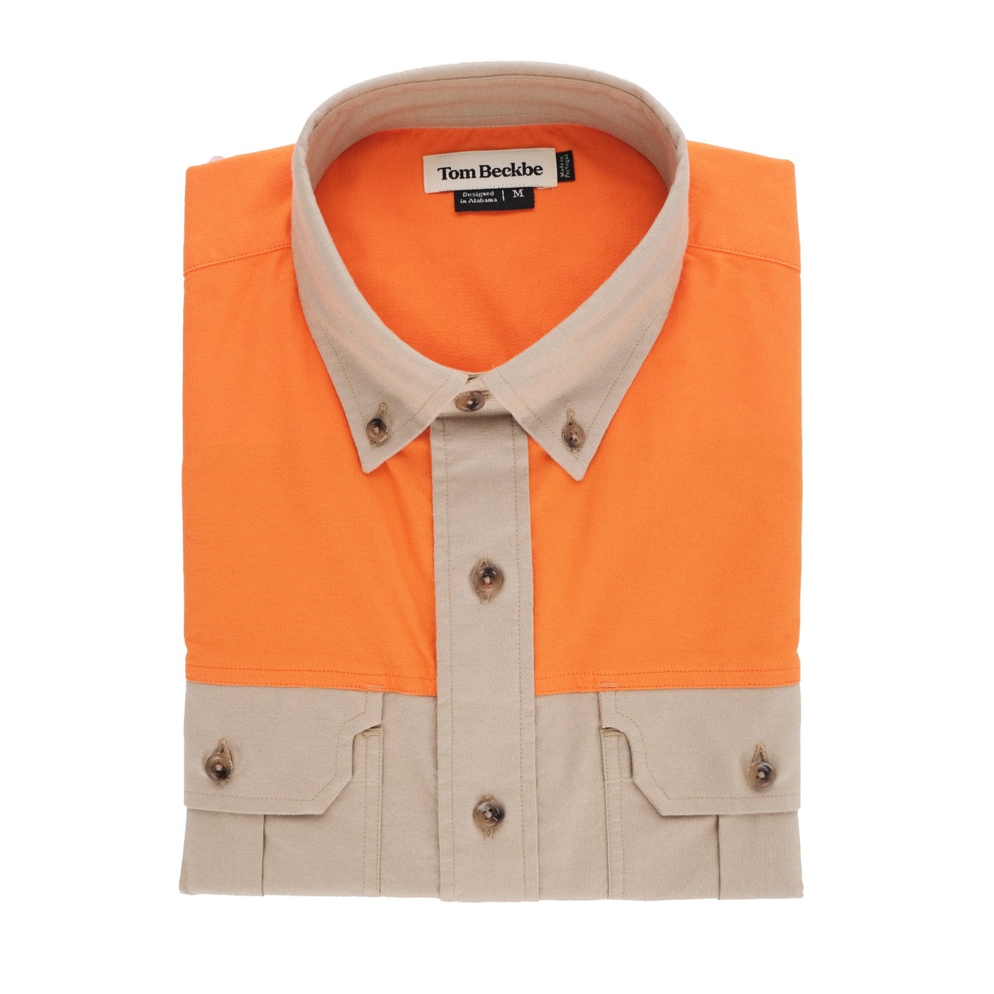 Folded orange Uplander Shirt by Tom Beckbe with beige collar, pocket accents, brown buttons in durable Cotton Oxford weave.