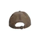 Tom Beckbe Waxed Cotton 6-Panel Hat - English Setter, shown from the back with logo and leather adjustable strap.