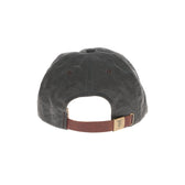 Rear view of Tom Beckbes dark green Waxed Cotton 6-Panel Baseball Hat with leather strap and metal clasp for adjustment.