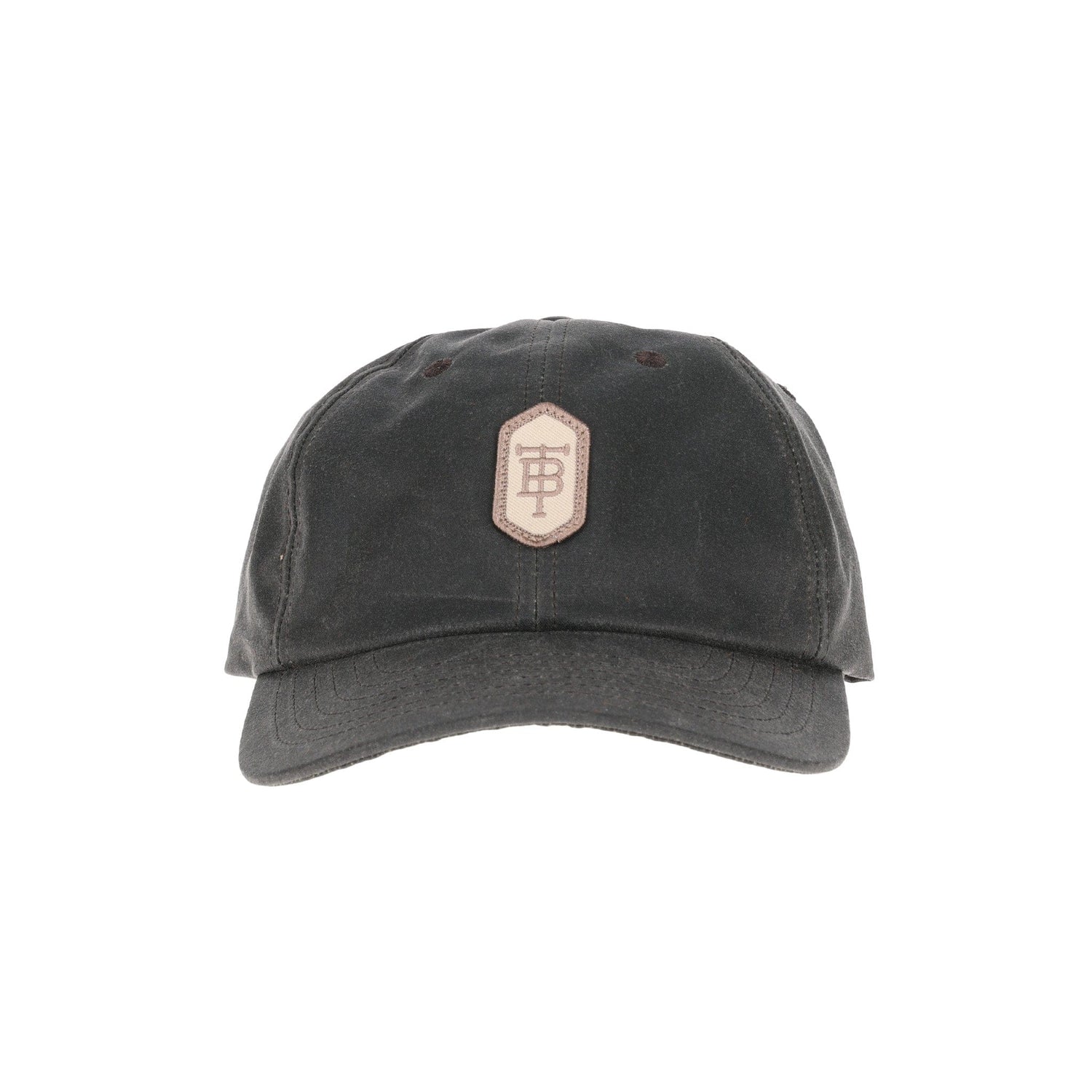 Tom Beckbes Waxed Cotton 6-Panel Baseball Hat features a dark cap with a beige and brown hexagonal B emblem.