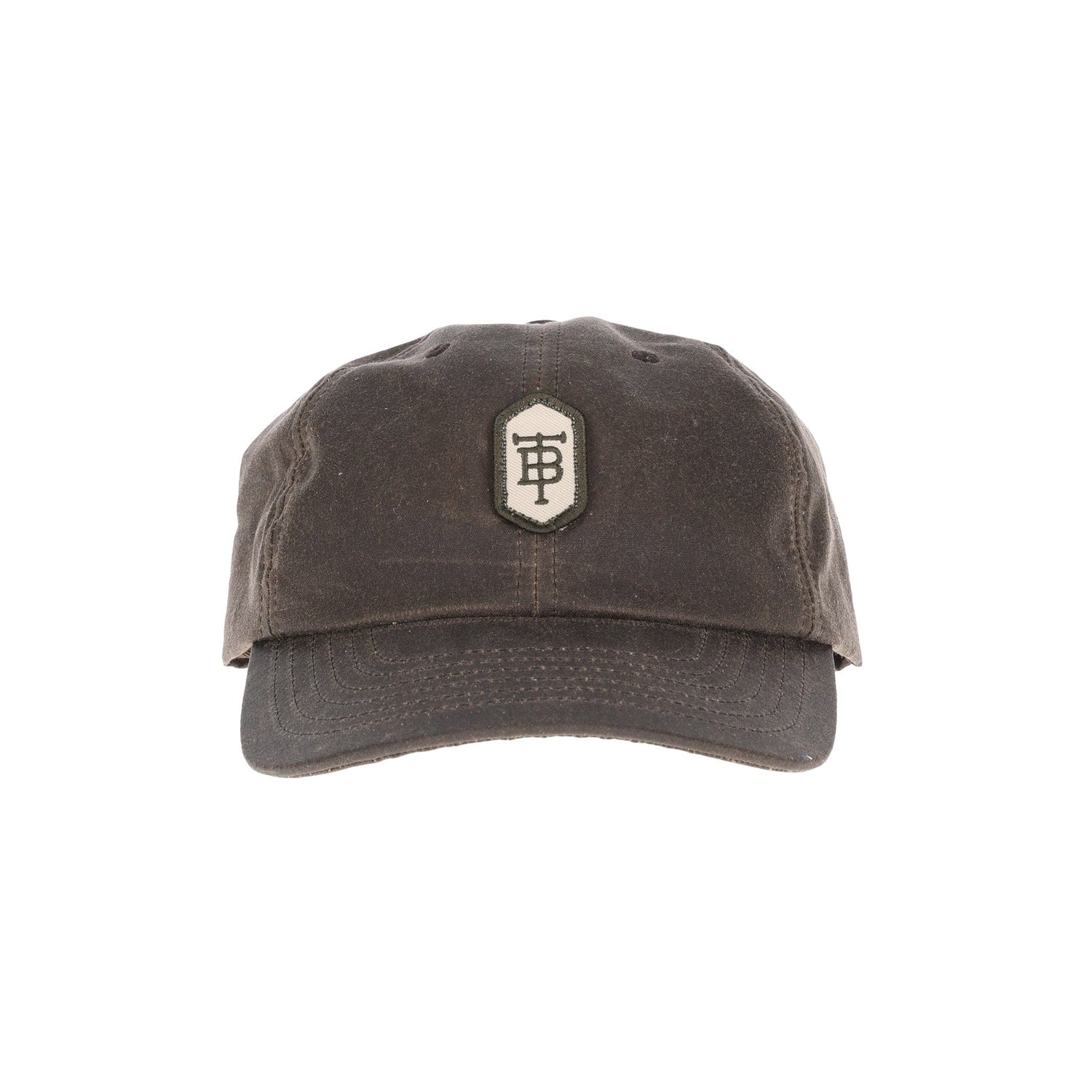Tom Beckbes Waxed Cotton 6-Panel Hat in brown has a hexagonal patch, stylized H, and full-grain leather back strap.