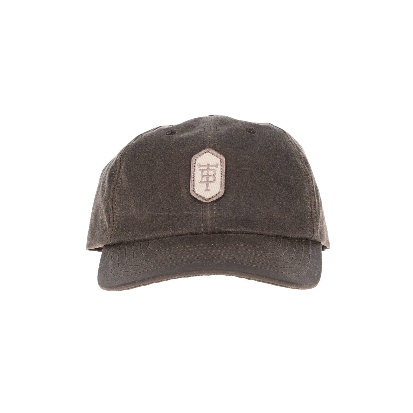 Tom Beckbes Waxed Cotton 6-Panel Baseball Hat features a dark brown design, embroidered patch, and premium leather strap.