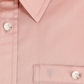 Close-up of Tom Beckbe Women's Tidewater Shirt with white buttons and subtle embroidered monogram near the pocket.