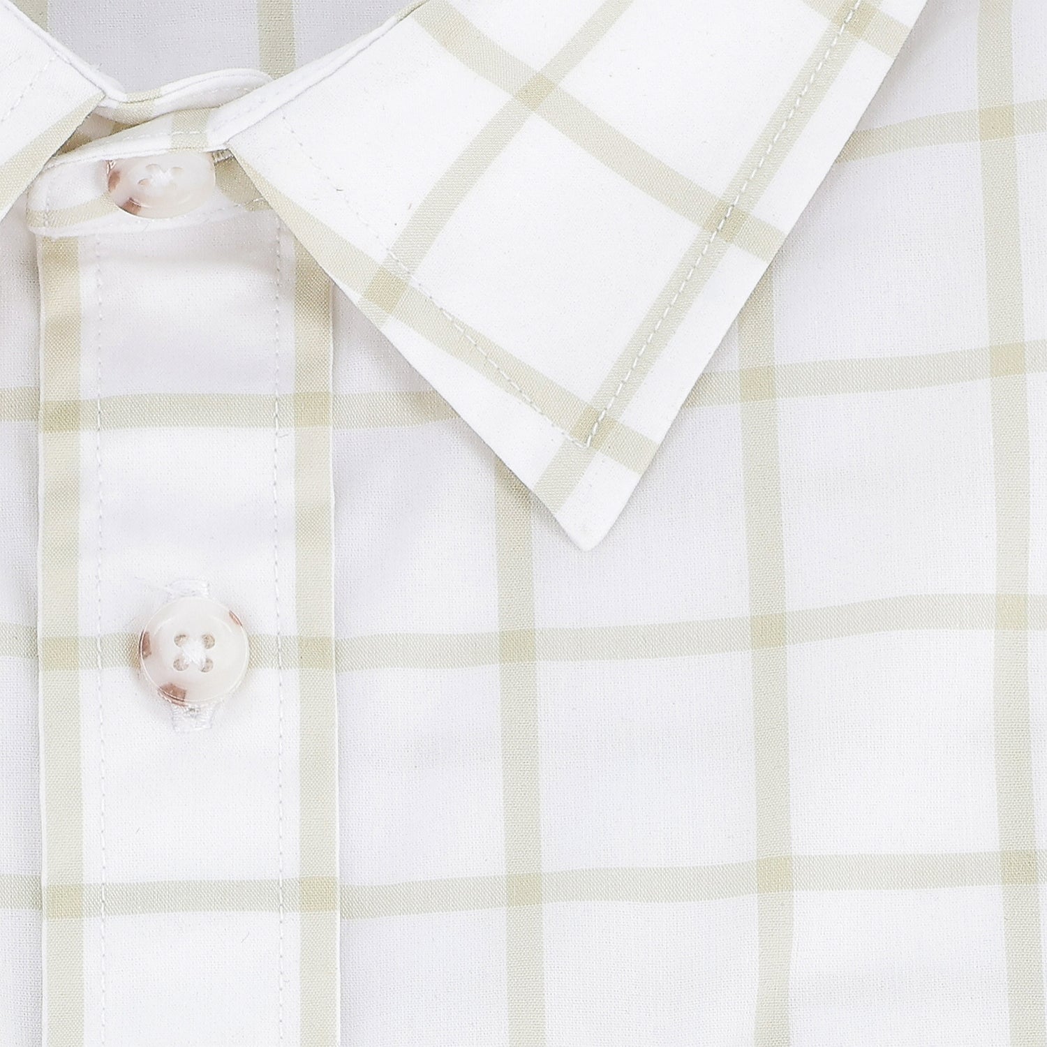 Close-up of the Tom Beckbe Women's Tidewater Shirt in white with a light beige plaid pattern and white buttons.