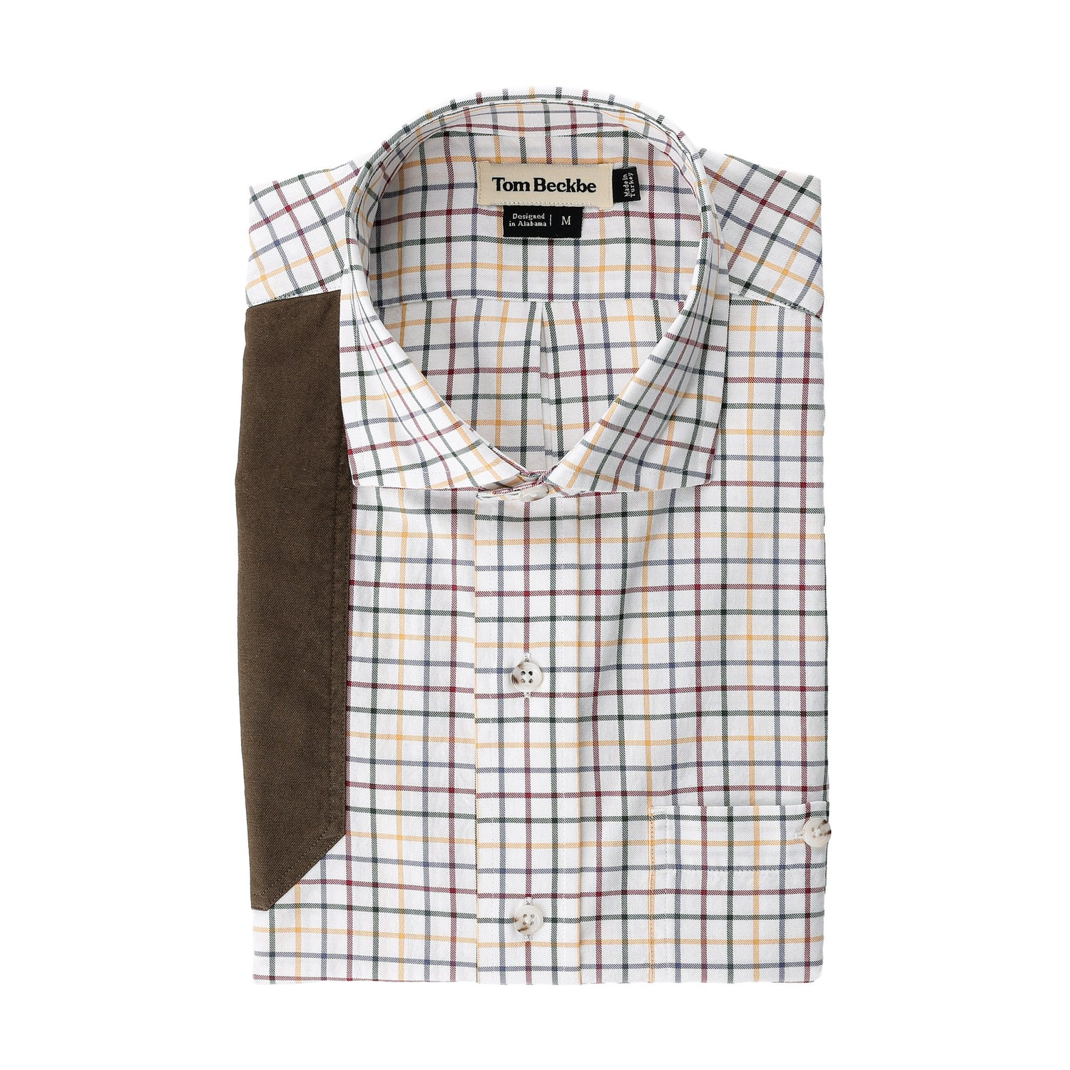 Carrington Shooting Shirt by Tom Beckbe: Folded plaid cotton with brown suede shoulder patch and branded collar label.