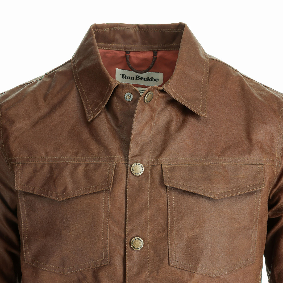 Tom Beckbe Chatom Jacket: brown men’s waxed, weatherproof jacket with chest pockets and snap buttons.