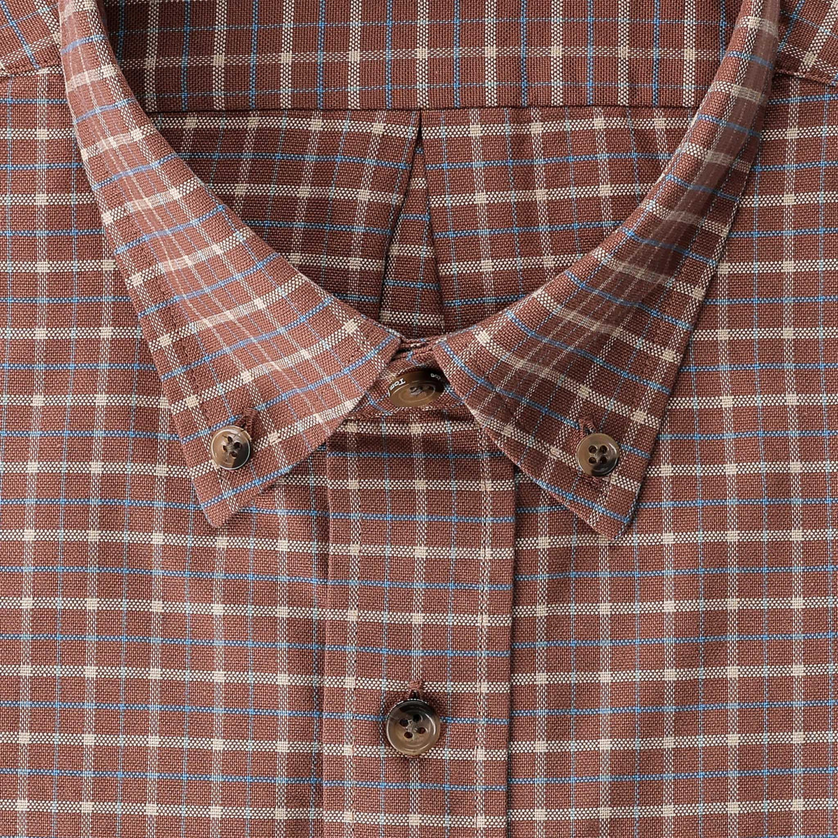 Close-up of the Tom Beckbe Culver Oxford Shirt in brown plaid with blue and white stripes, crafted from breathable fabric.