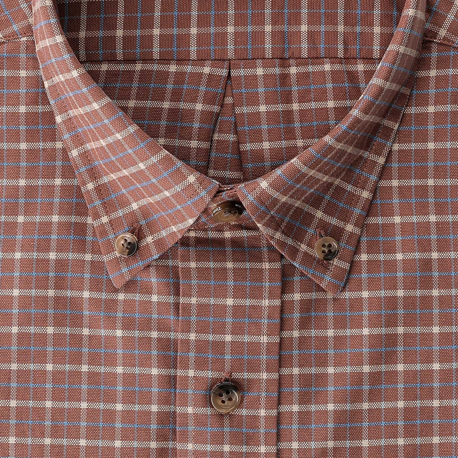 Close-up of the Tom Beckbe Culver Oxford Shirt in brown plaid with blue and white stripes, crafted from breathable fabric.