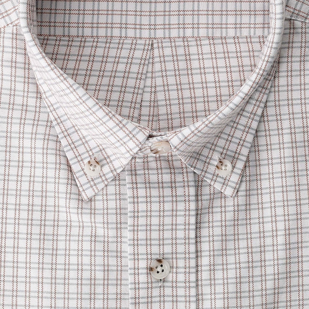 Tom Beckbe Culver Oxford Shirt: breathable fabric, brown/gray grid, button-down collar, white buttons, close up.
