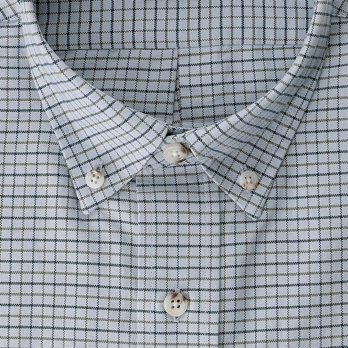 Close-up of Tom Beckbe’s Culver Oxford Shirt in light blue and white checks, made from breathable oxford fabric.