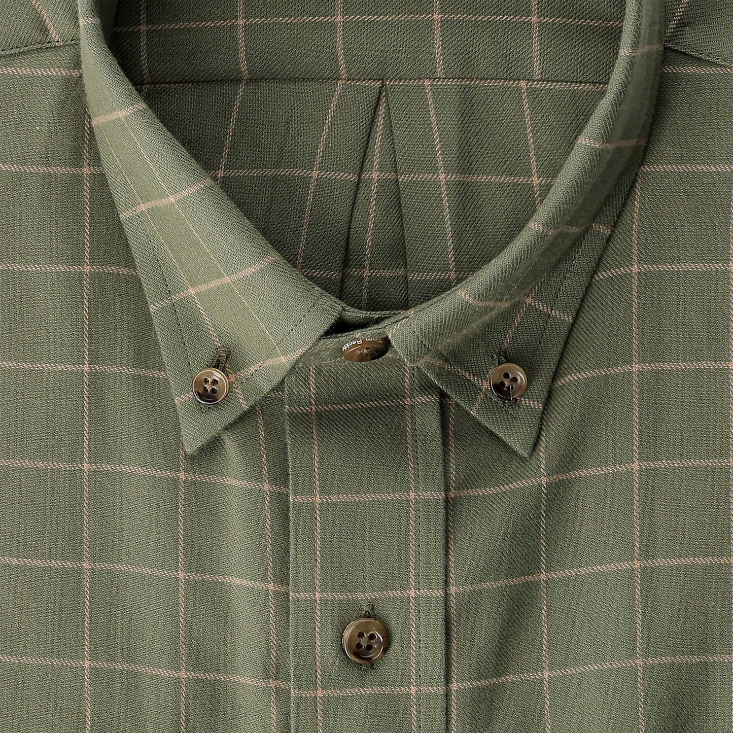 Close-up of a green plaid button-down shirt with light-colored grid lines and brown buttons.
