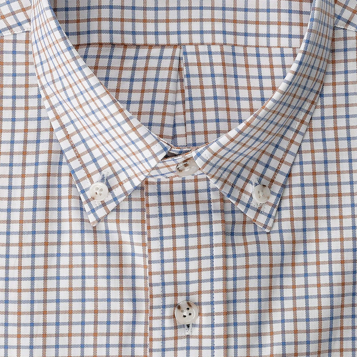 Close-up of the Tom Beckbe Ensley Pinpoint Oxford Shirt in blue and brown plaid on a white background.