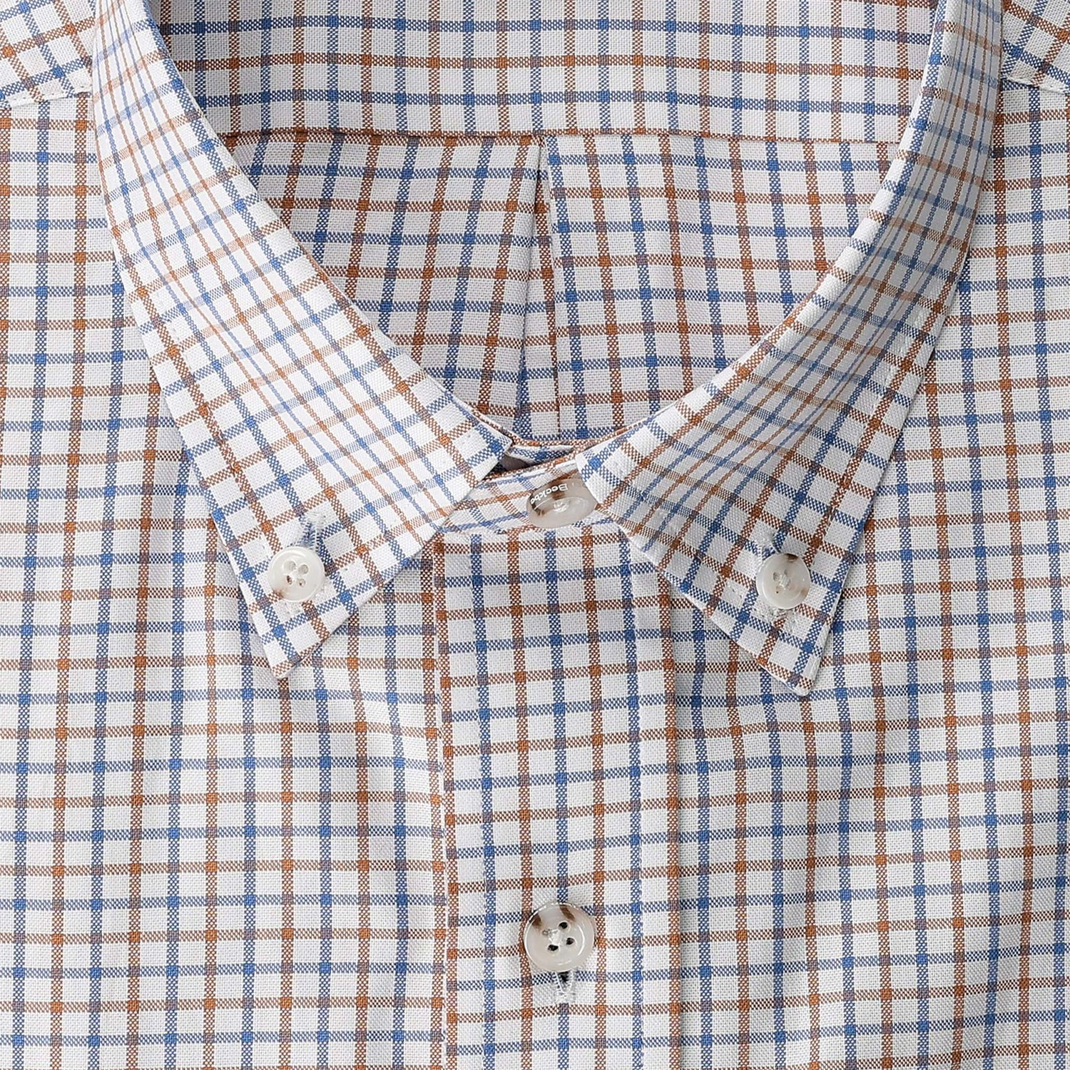 Close-up of the Tom Beckbe Ensley Pinpoint Oxford Shirt in blue and brown plaid on a white background.
