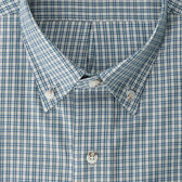 Close-up of Tom Beckbe’s Ensley Pinpoint Oxford Shirt collar, showing blue and white plaid and buttons.