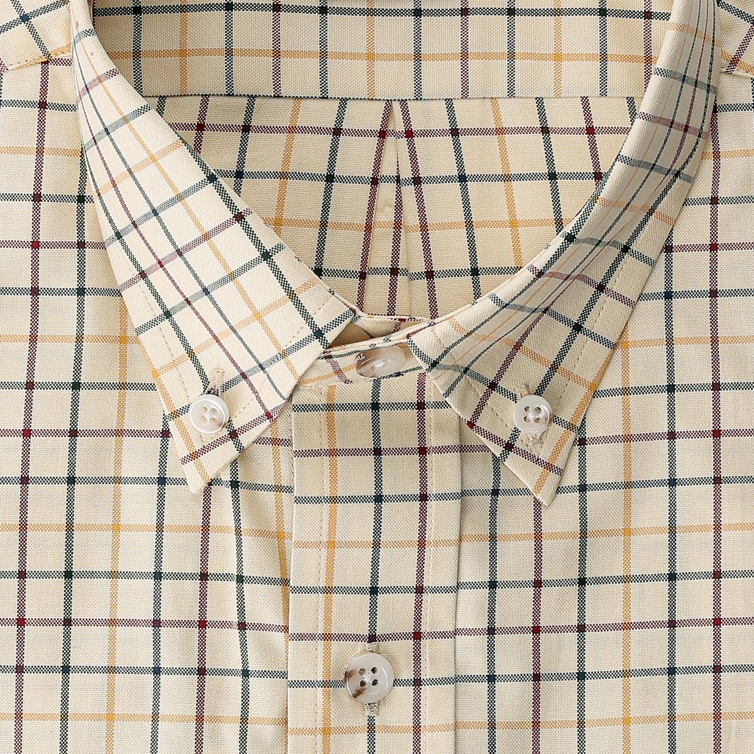 Close-up of the Tom Beckbe Ensley Pinpoint Oxford Shirt with a beige plaid and checkered yellow, red, and black pattern.