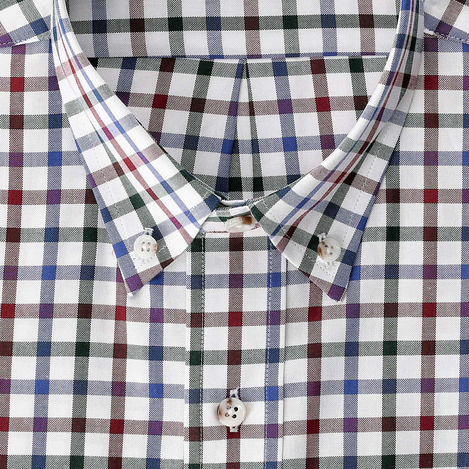 Close-up of the Tom Beckbe Ensley Pinpoint Oxford Shirt featuring multicolor plaid in blue, red, green, and white.