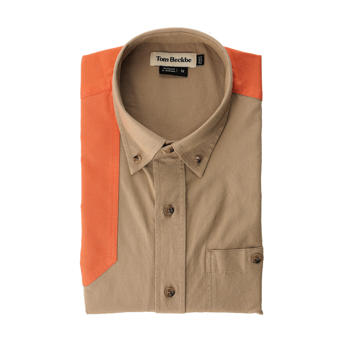 Tan Tom Beckbe Perry Field Shirt with orange shoulder accents, button-up, folded neatly showing the label.
