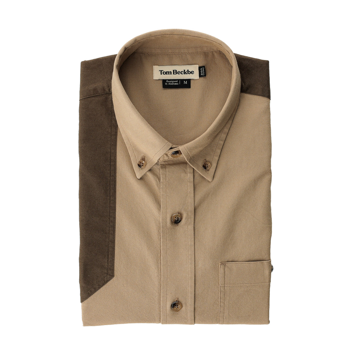 Perry Field Shirt by Tom Beckbe in beige with brown shoulders, folded with label visible inside collar.