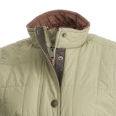 Women’s Tyler Quilted Vest by Tom Beckbe—light beige, brown collar, zip & snap for stylish sustainable outerwear.
