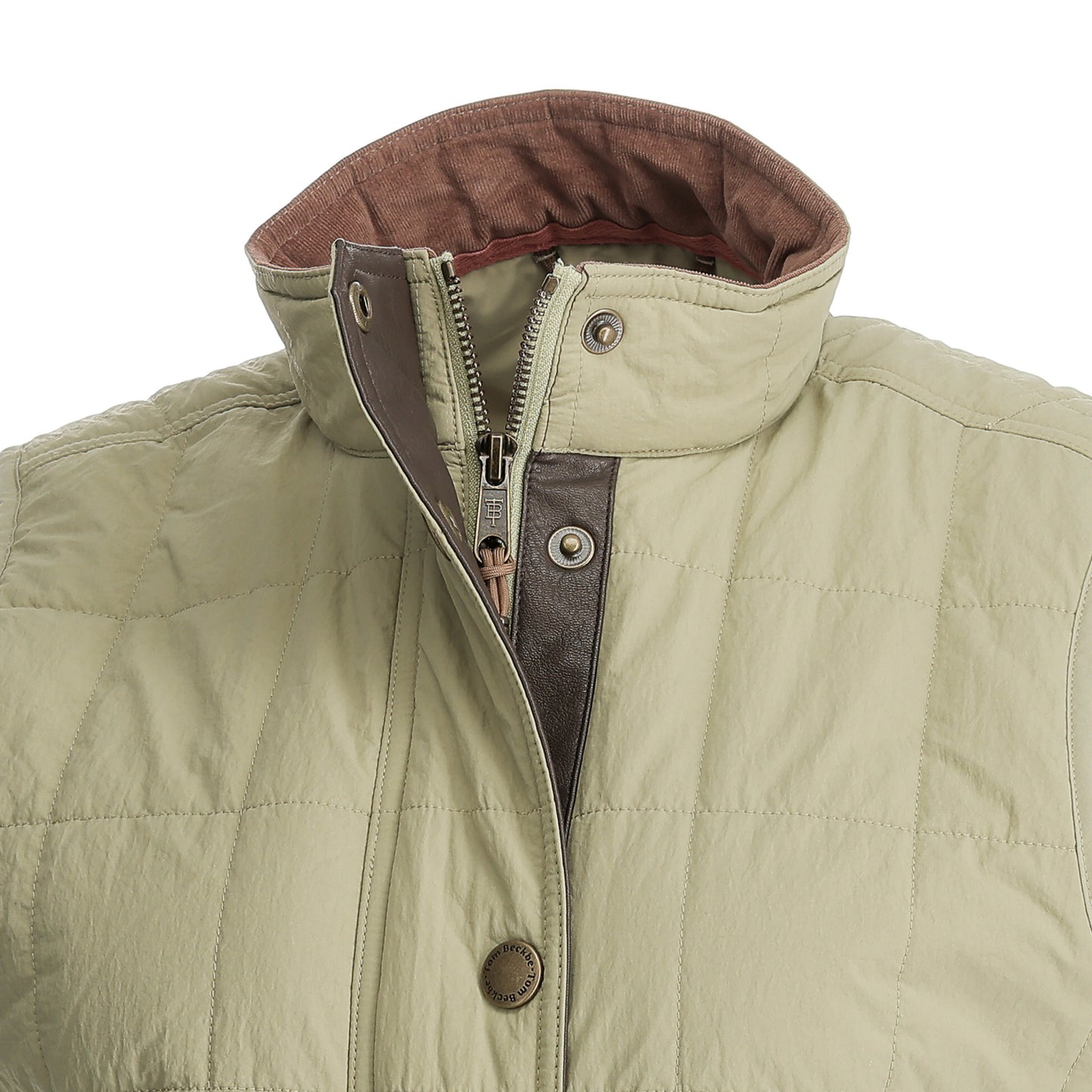 Women’s Tyler Quilted Vest by Tom Beckbe—light beige, brown collar, zip & snap for stylish sustainable outerwear.