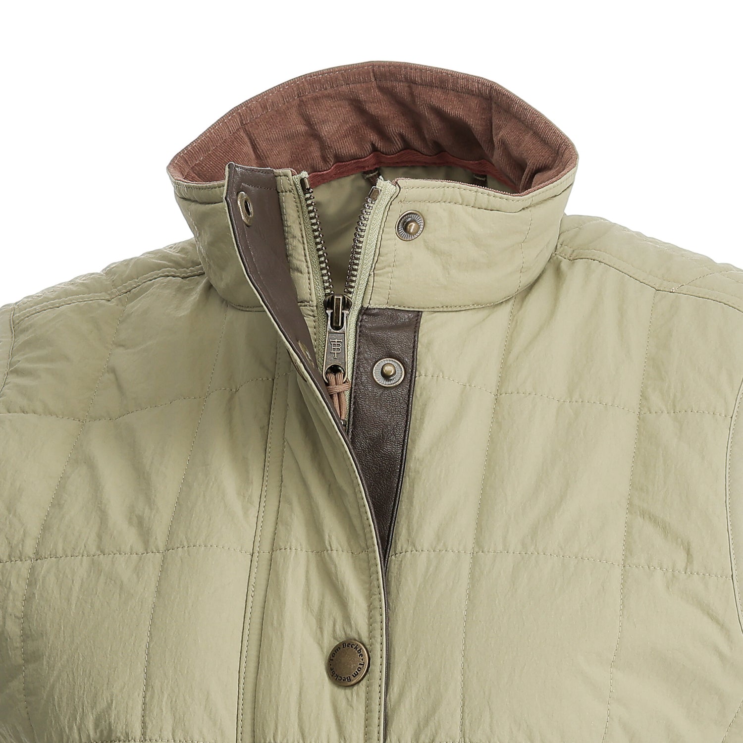 Women’s Tyler Quilted Vest by Tom Beckbe—light beige, brown collar, zip & snap for stylish sustainable outerwear.