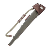 The Tom Beckbe DU Canvas Gun Sleeve is a padded green and brown case with shoulder strap, ideal for carrying your firearm.