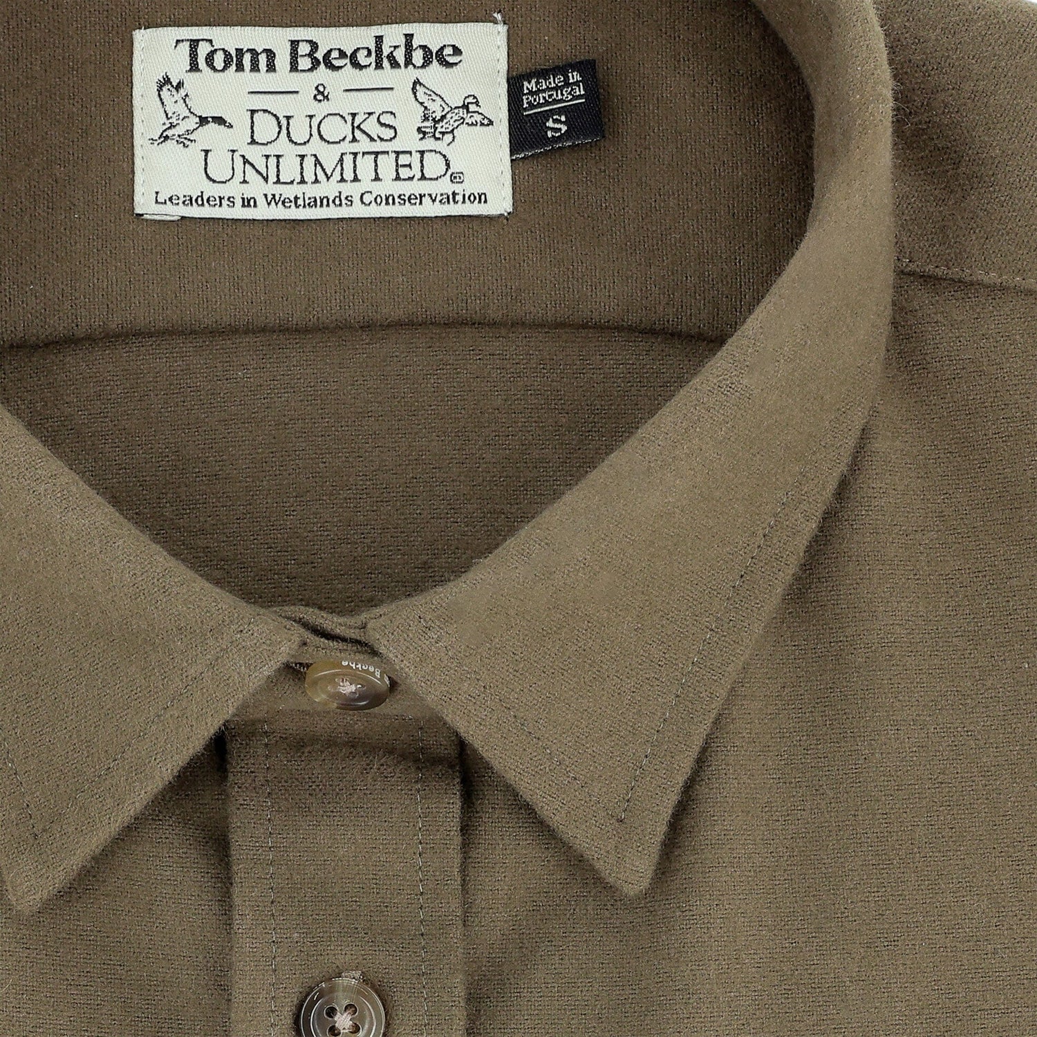 Close-up of a Tom Beckbe Womens Mackay Moleskin Shirt in brown, size small, with label visible.