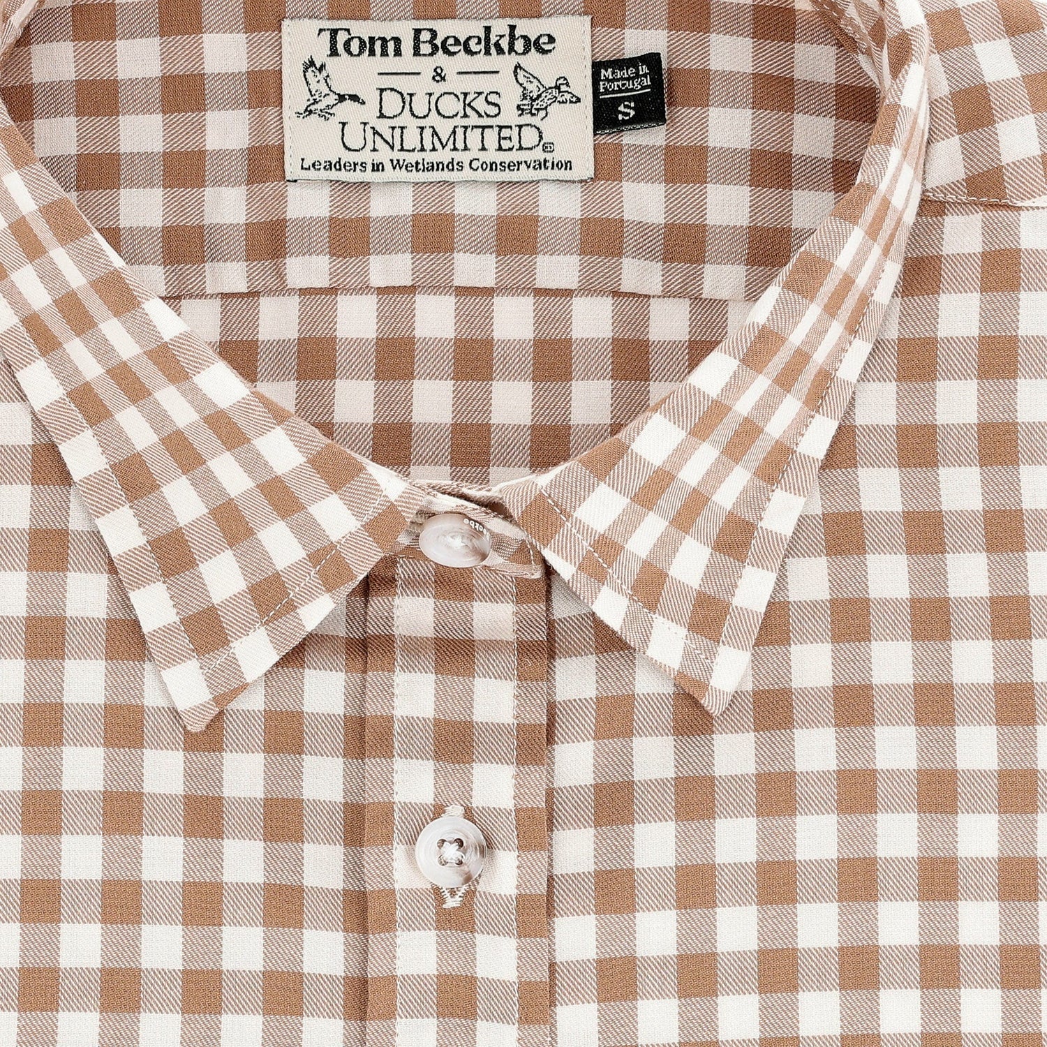 Close-up of the Womens Smyth Cotton Twill Shirt by Tom Beckbe with brown and white checks and classic collar.