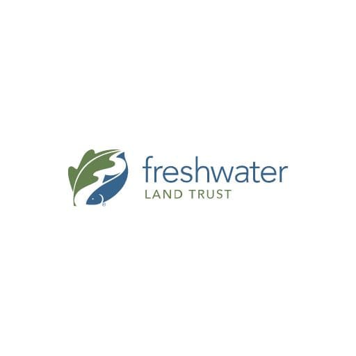 Logo of Freshwater Land Trust featuring a green leaf and water design with the organizations name in blue and green text.