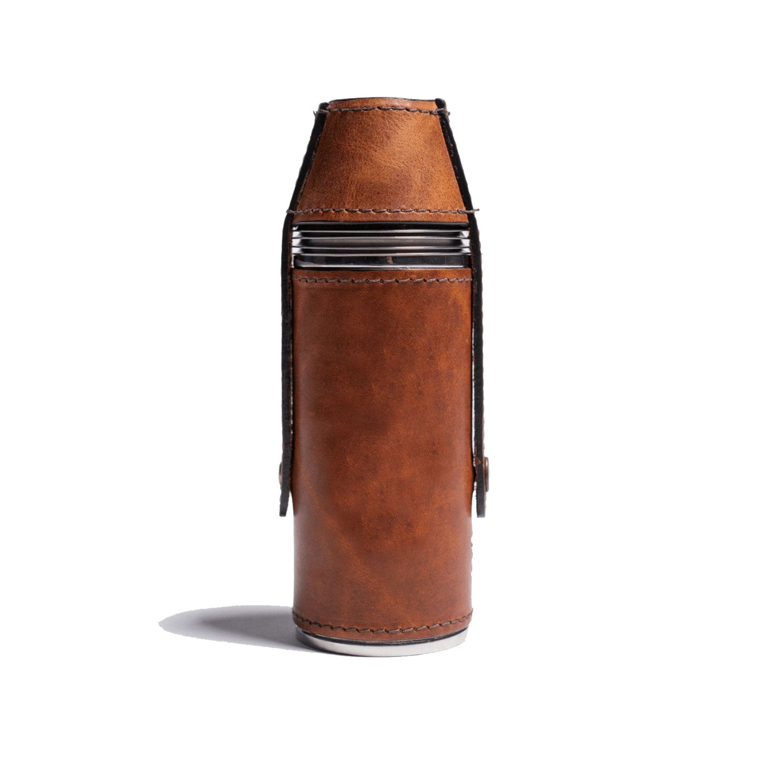 Side view of a bottle flask wrapped in full-grain chestnut leather with a snap lid securing four cups
