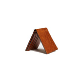 The leather bifold wallet is durable and features a slim silhouette that accommodates all essentials